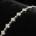 MOISSANITE LILY CUT FOUR LEAF CLOVER TENNIS BRACELET IN STERLING SILVER